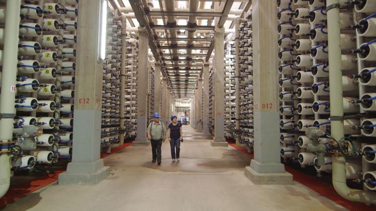Abraham Tenne, retired head of desalination for the Israel Water Authority, and Professor Sharon Megdal at the Hadera Desalination Plant.